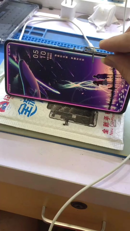 红米k40指纹键一碰就关机